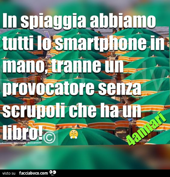 In spiaggia abbiamo tutti lo smartphone in mano, tranne un provocatore senza scrupoli che ha un libro